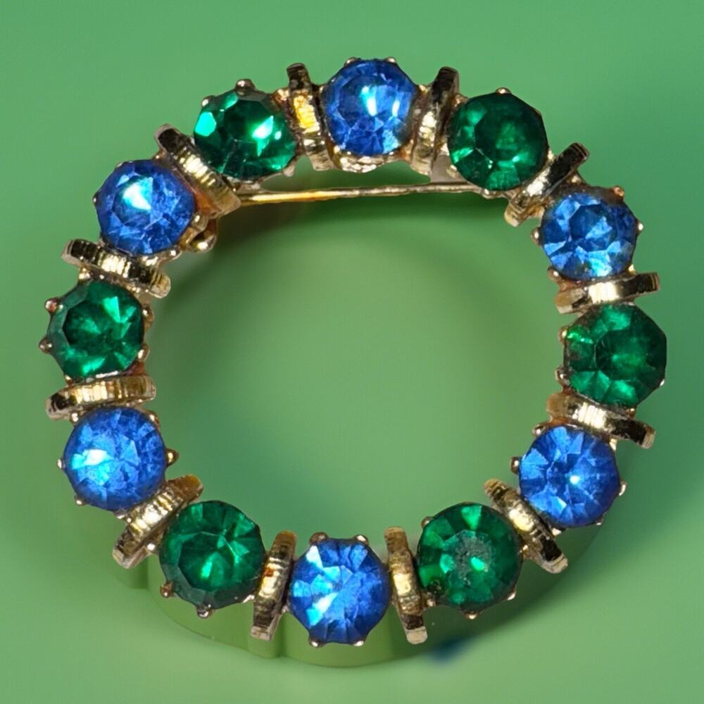 Vintage Blue Green Rhinestone Circle Brooch Gold Tone Open Circle Wreath Pin